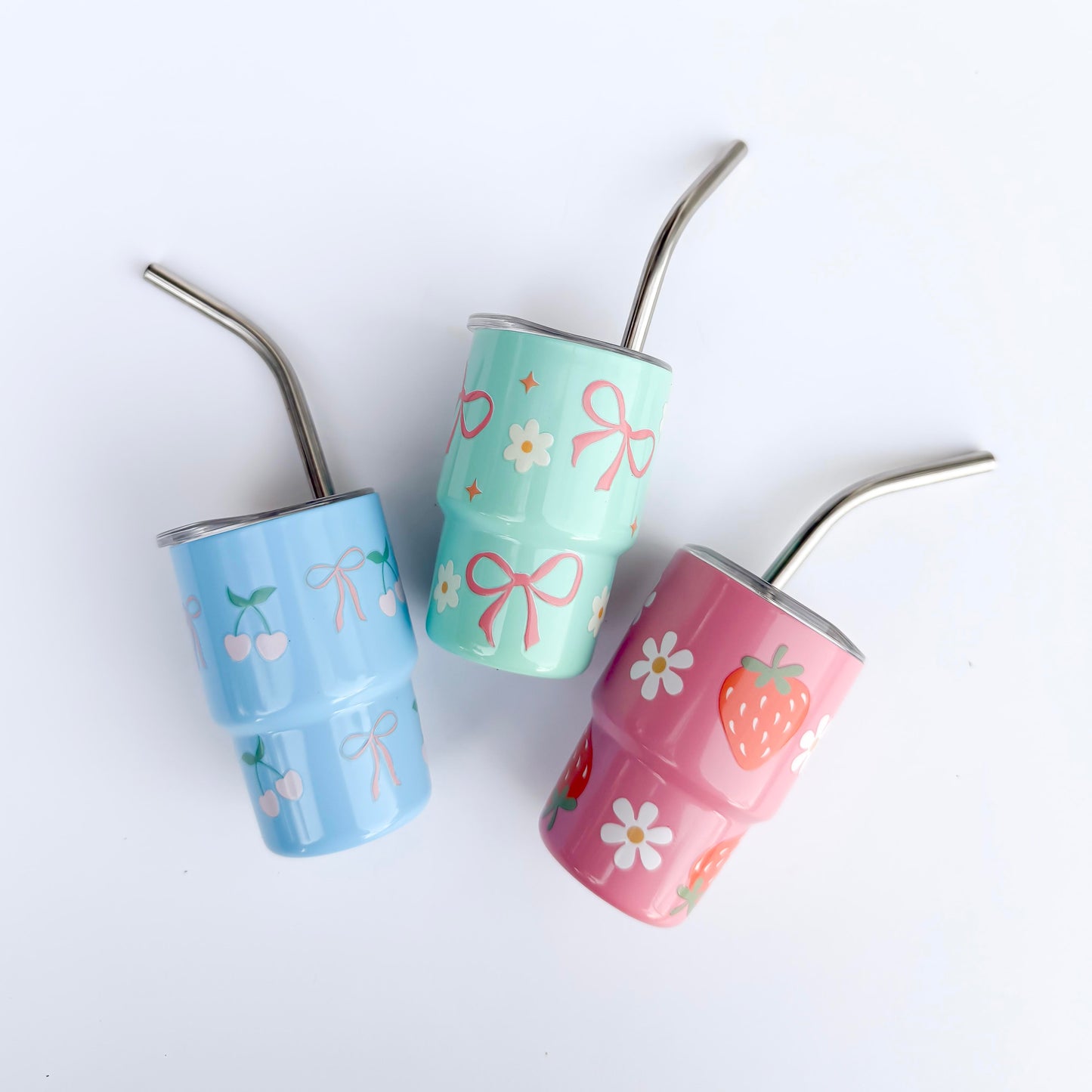 Mini 3oz tumblers with eco-friendly metal straws and hand-painted romantic designs, perfect for bridal showers or Galentine’s Day celebrations