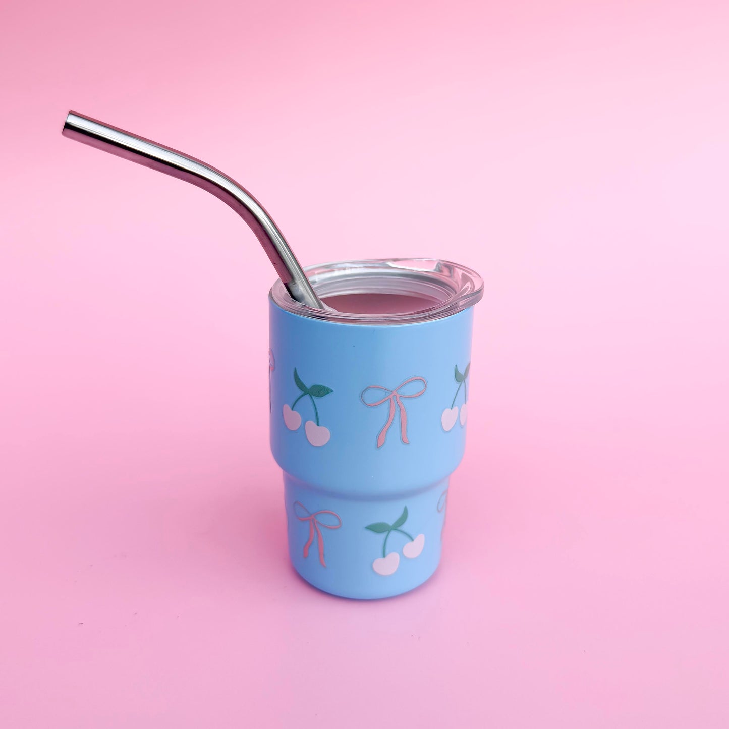 Small stainless steel cup with a pink bow design and cherries , reusable straw, and spill-proof lid, ideal for Valentine’s Day gifts or party favors