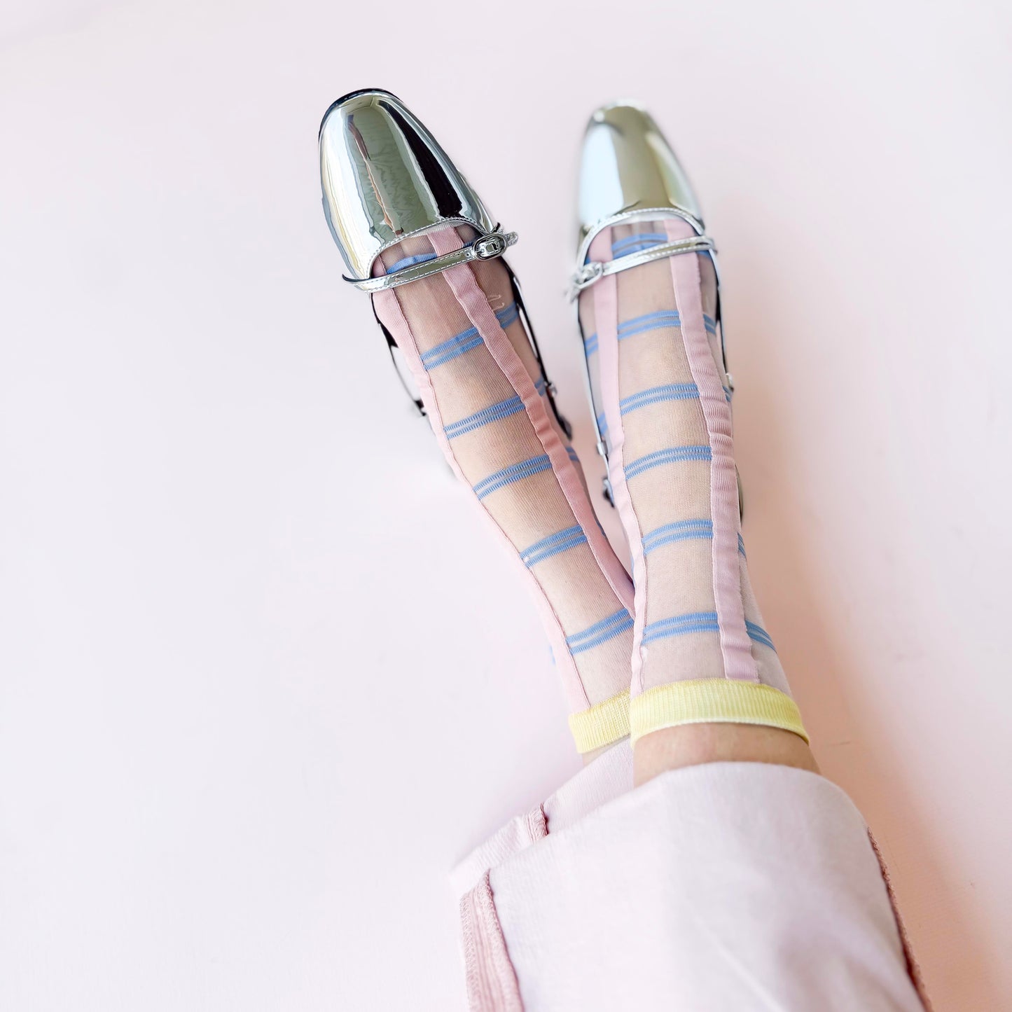 Pastel plaid with bold contrast lines and a classic aesthetic worj with a silver ballet flat shoe